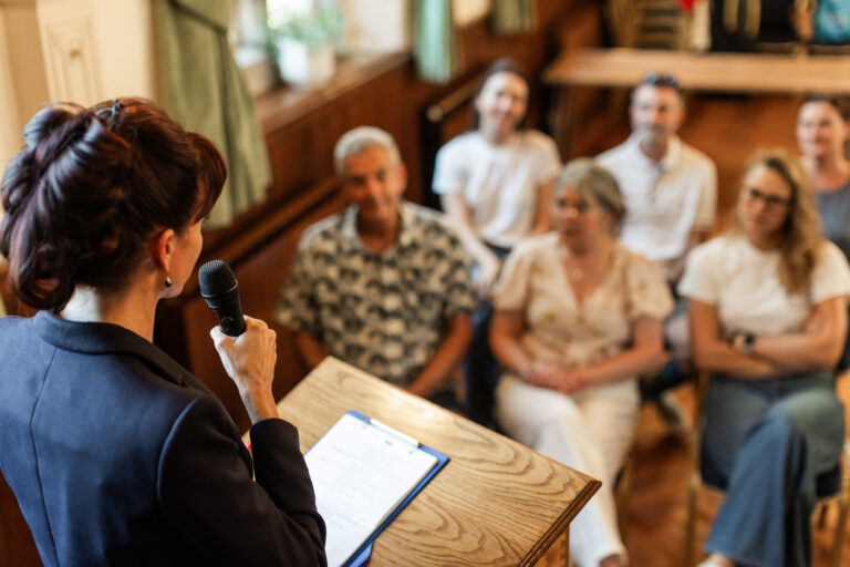 Candidate during a hustings speaking to the public